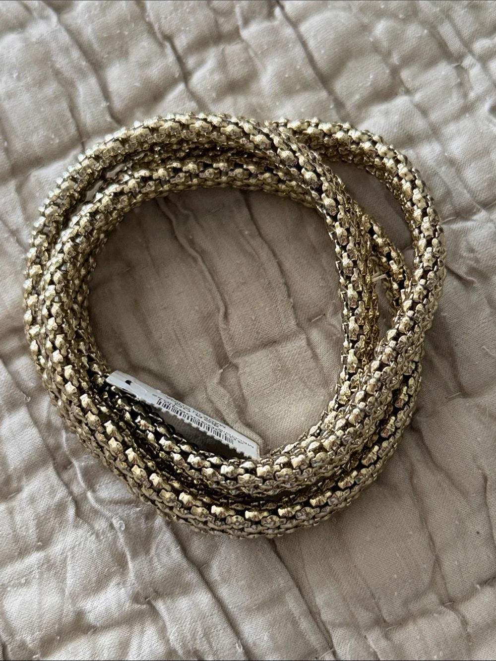 Set of three new with tags gold tone bracelet stretch